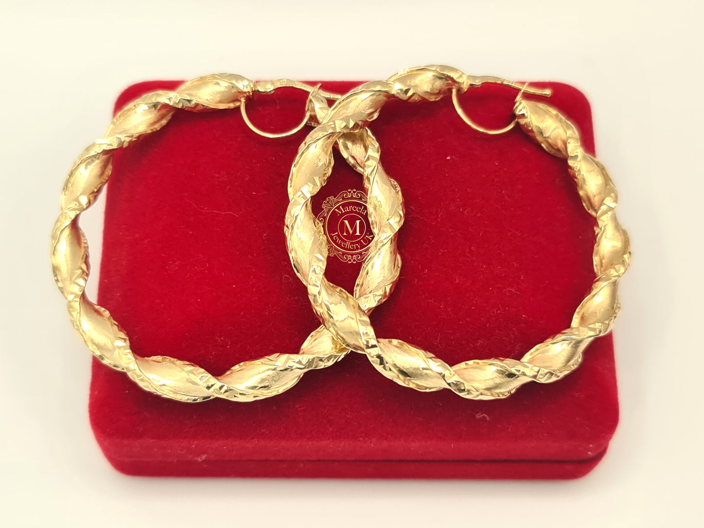 Brand New 9 carat Gold Satin twist hoop ladies earrings