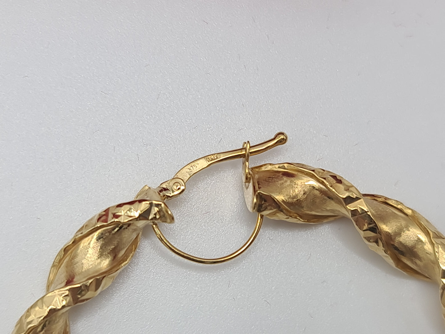 Brand New 9 carat Gold Satin twist hoop ladies earrings