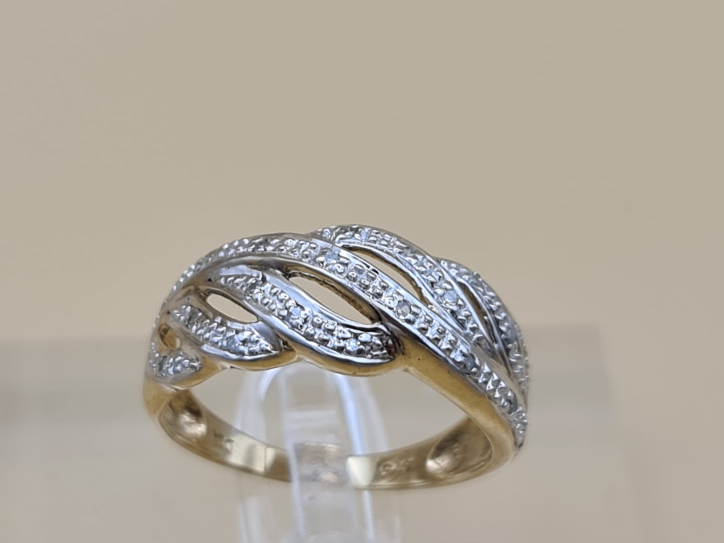 9 carat gold diamond crossover eternity ring