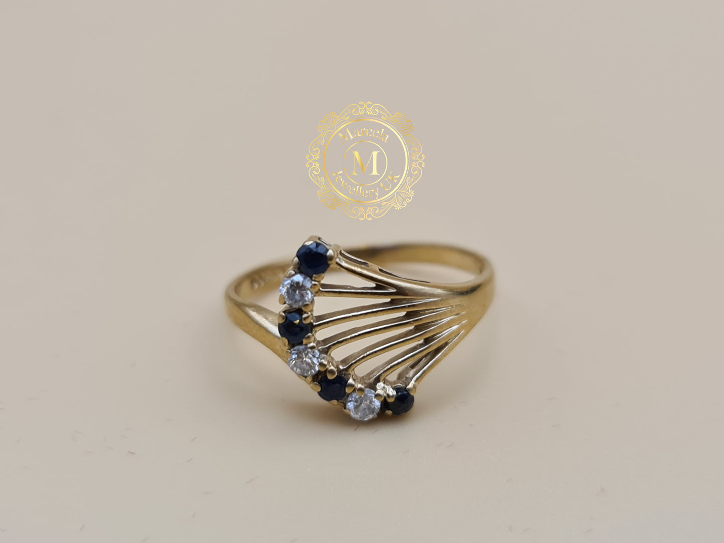 9 Carat Gold Stylised Sapphire and Cubic Zirconia Dress Ring