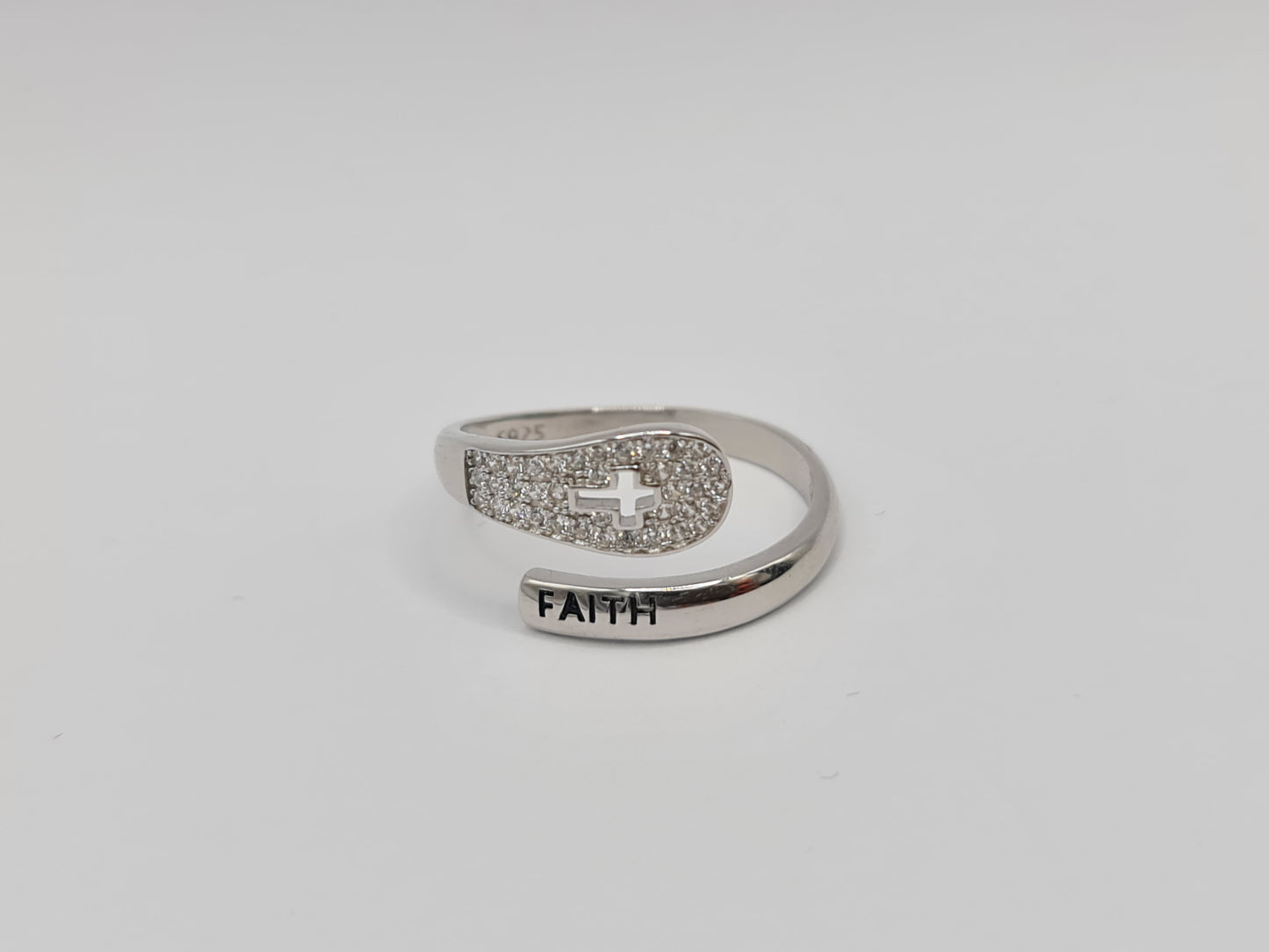 Brand New "Faith and Cross " ring adorned with cubic zirconia stones in Sterling Silver