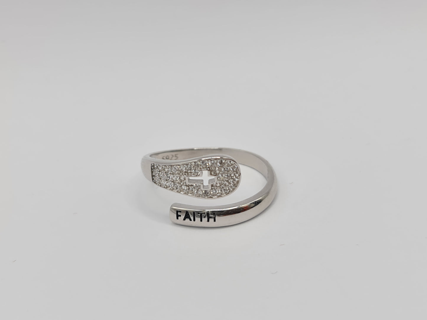 Brand New "Faith and Cross " ring adorned with cubic zirconia stones in Sterling Silver