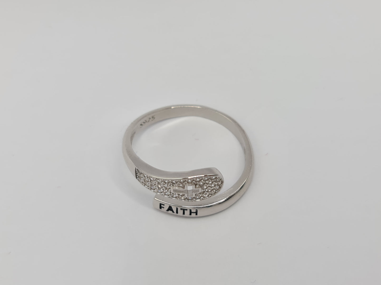 Brand New "Faith and Cross " ring adorned with cubic zirconia stones in Sterling Silver