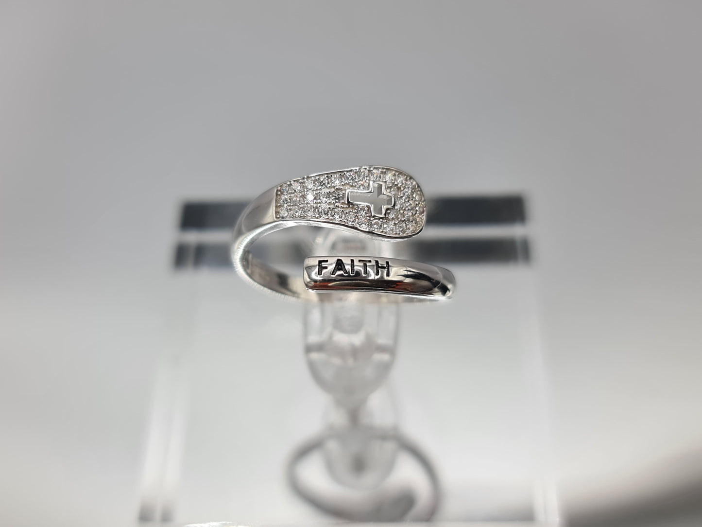 Brand New "Faith and Cross " ring adorned with cubic zirconia stones in Sterling Silver