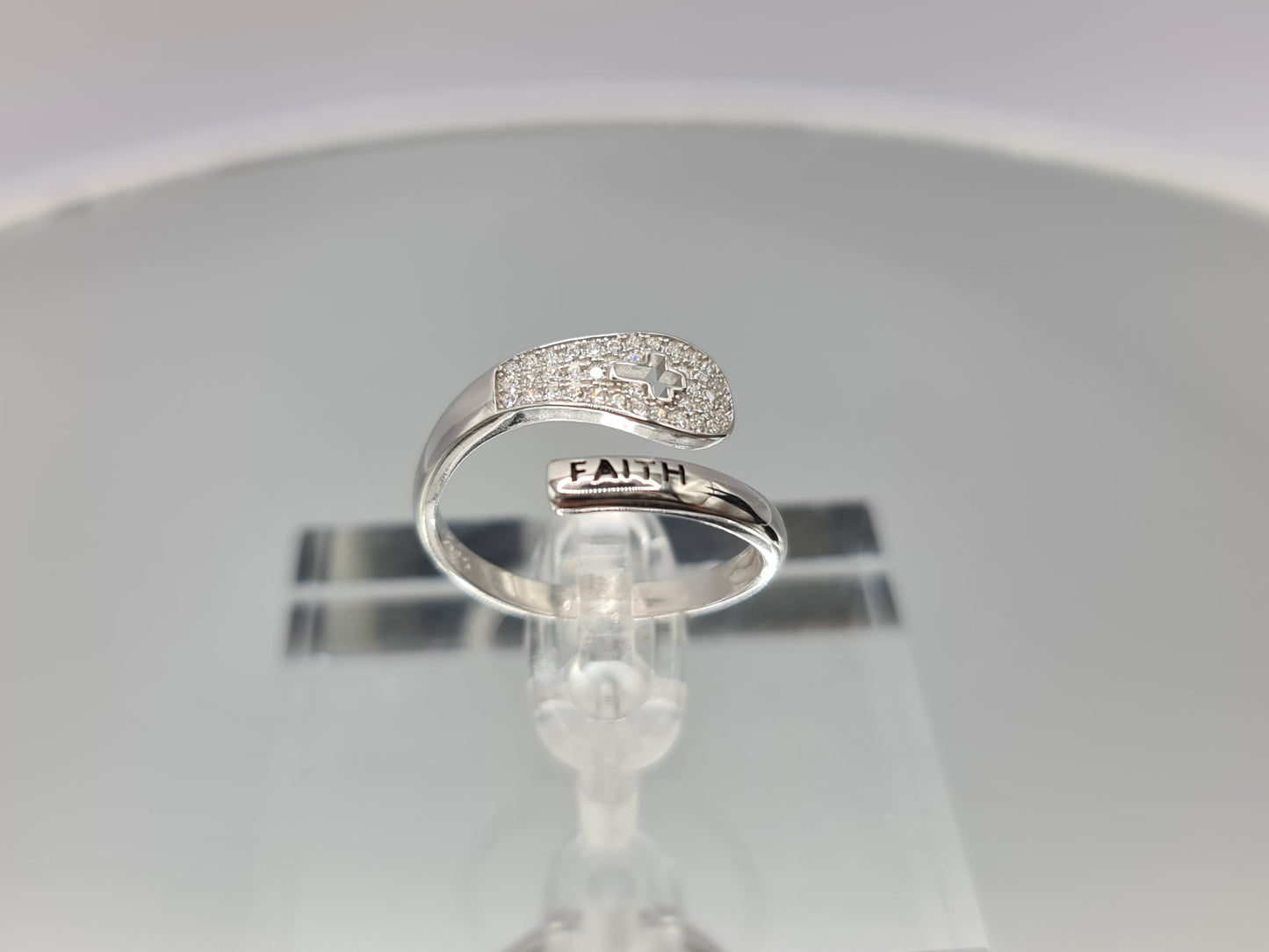 Brand New "Faith and Cross " ring adorned with cubic zirconia stones in Sterling Silver