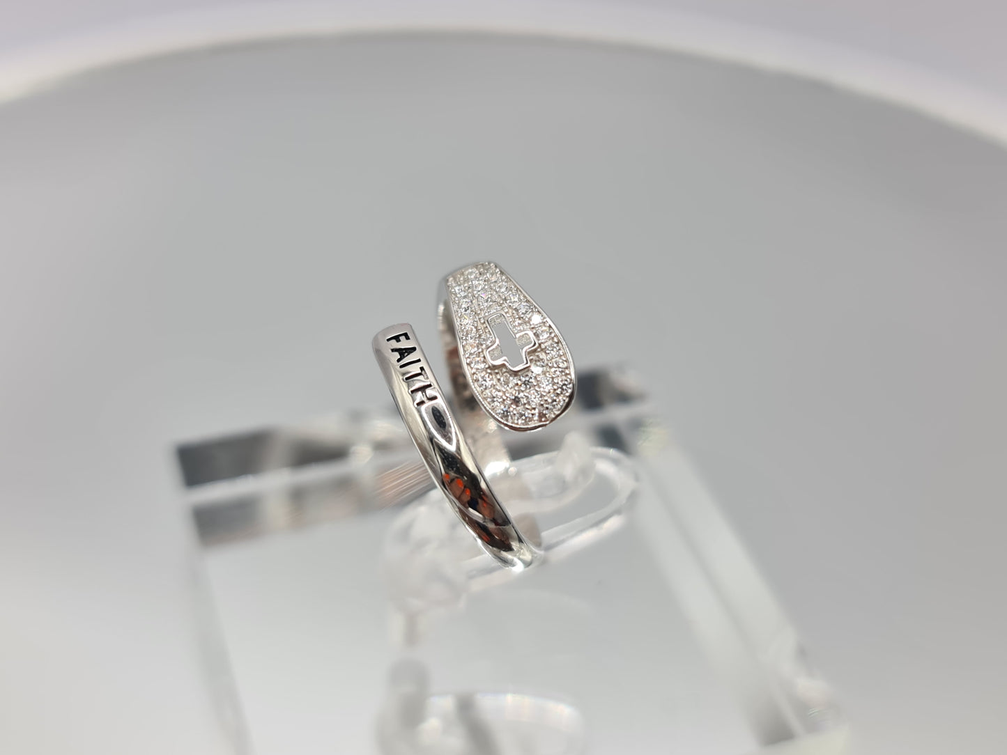 Brand New "Faith and Cross " ring adorned with cubic zirconia stones in Sterling Silver