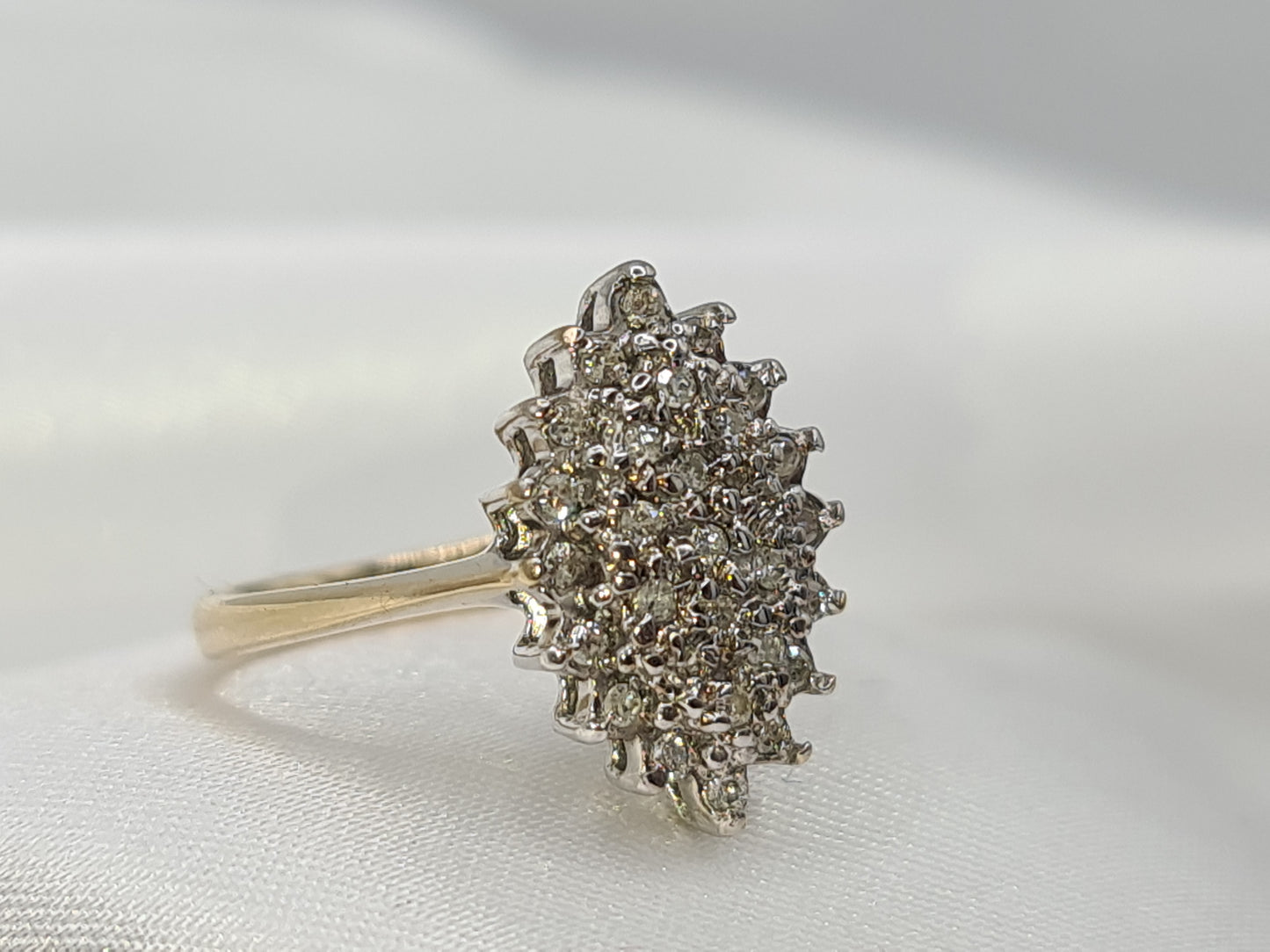 Pre-Owned Diamond Cluster ring set in 9 carat gold size N½