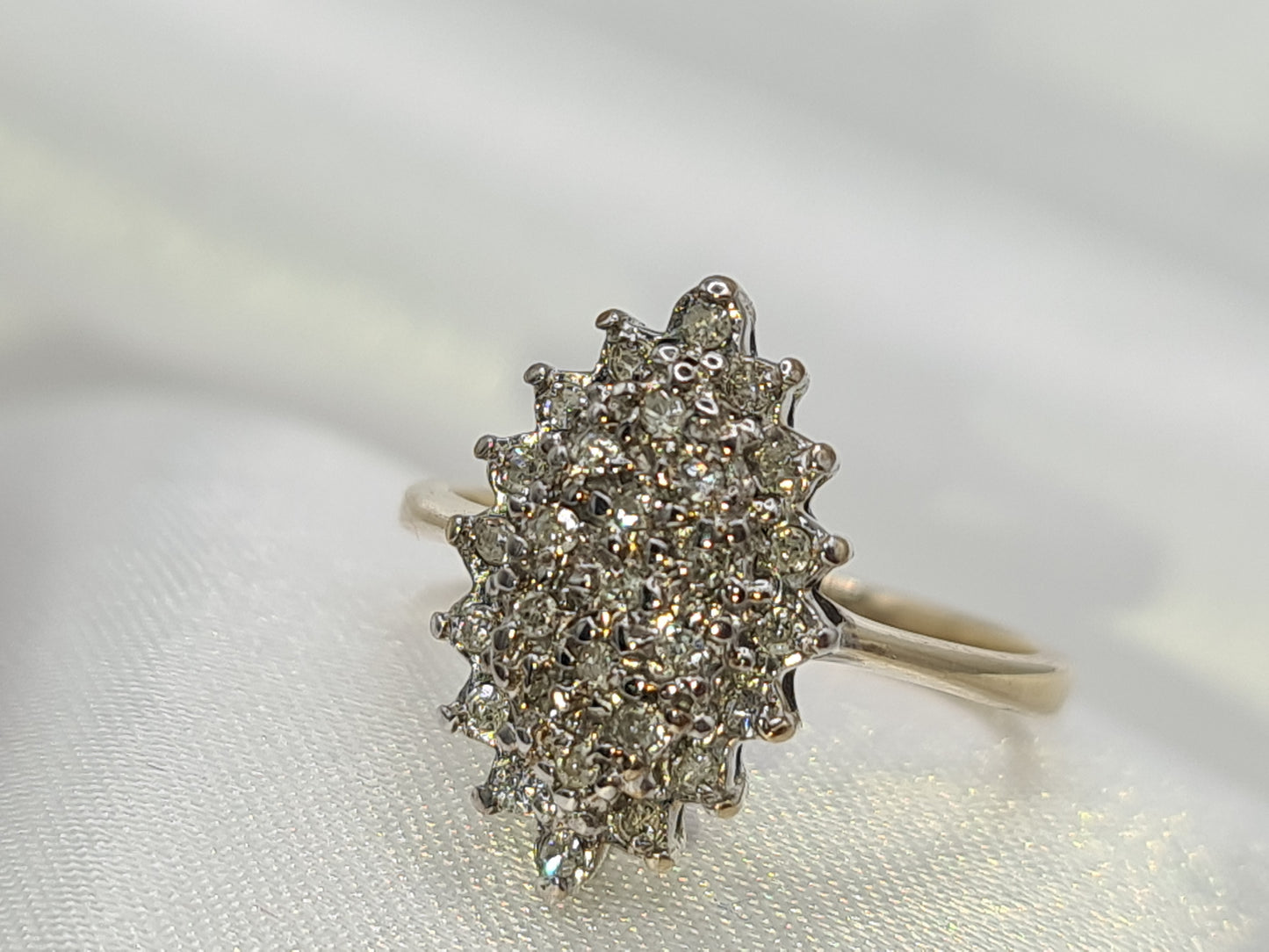 Pre-Owned Diamond Cluster ring set in 9 carat gold size N½