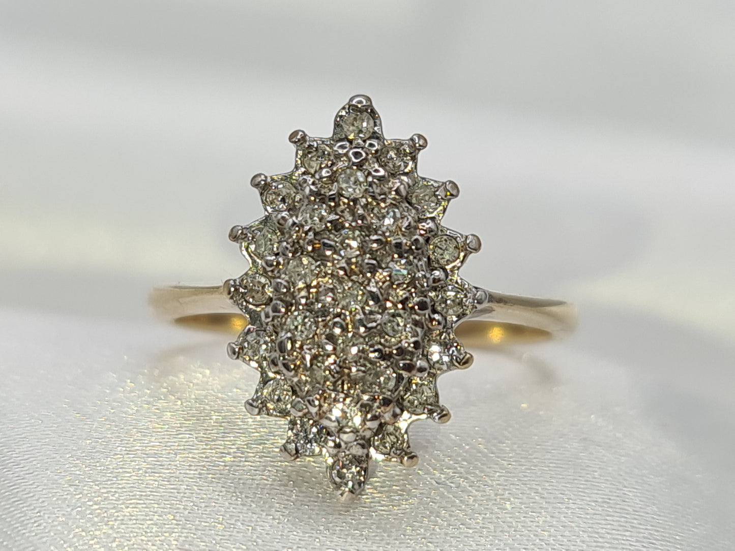 Pre-Owned Diamond Cluster ring set in 9 carat gold size N½