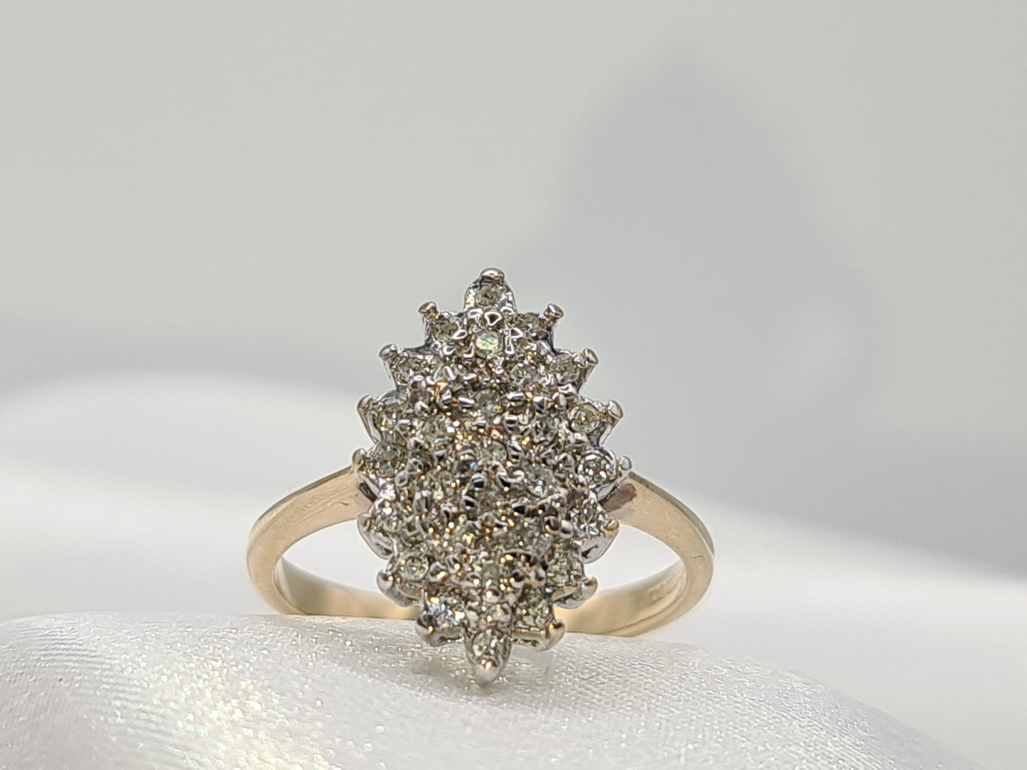 Pre-Owned Diamond Cluster ring set in 9 carat gold size N½