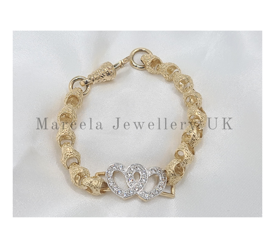 Brand new 9 carat gold Acorn and Hearts cz Bracelet 7 inch